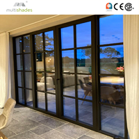 Porte pliante de luxe MULTISHADES pour villa, transformant les espaces avec un design minimaliste et contemporain