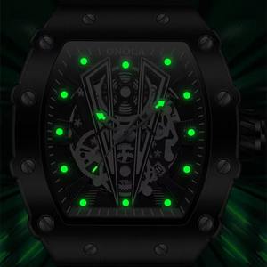 Drioshipping Montre à quartz pour hommes Offre Spéciale Casual Waterproof Alloy Creative Silicone Band 43mm Hollow Character New Fashionable - Product Image 3