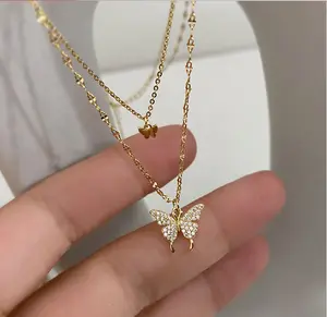 Collana con ciondolo a farfalla con zirconi di design in argento dorato con catena a doppio strato per accessori per gioielli per ragazze e donne 2023