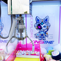 Machine à griffes double défi et pousseur de prix combinés : Distributeur de cadeaux innovant pour centres commerciaux