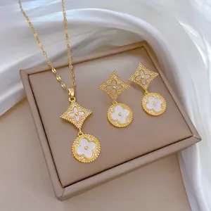 Nueva joyería de acero inoxidable de moda de lujo 18K chapado en oro trébol de cuatro hojas colgante collar pendiente conjuntos de joyería para mujeres
