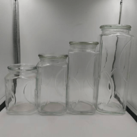 Vente en gros de grands pots de cornichons en verre épaissi pot de stockage d'épices alimentaires avec couvercle hermétique grands pots de cornichons en verre