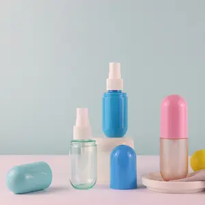 جديد تصميم اللون حبة كبسولة على شكل 40 مللي 60 مللي 100 مللي الوردي الأزرق مضخة قابلة للنقل لطيف الجملة البلاستيك زجاجات رذاذ زجاجة