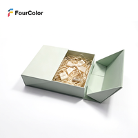 Nouvelle boîte cadeau pliable de luxe en carton rigide avec design personnalisé, laminage mat, vernis sélectif UV et fermeture magnétique