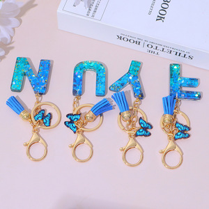 Colgante de borla con letras de la A a la Z en epoxi degradado azul y mariposa, un souvenir muy vendido para <span class=keywords><strong>bolsos</strong></span> de mujer. - Product Image 6