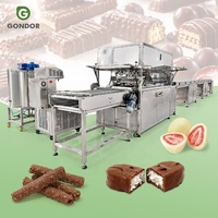 Machine de production manuelle de mini-biscuits, de cookies et de beignets, avec fonctions d'enrobage de fruits secs et de chocolat, et de refroidissement, à vendre