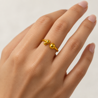 Bague moderne plaquée or avec trois accents de billes graduées, bijoux unisexes pour un usage quotidien