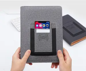 Marka yeni özelleştirilmiş A5 gevşek yaprak PU deri notebooklar günlüğü iş yılbaşı hediyeleri için logo güç banka kablosuz şarj ile