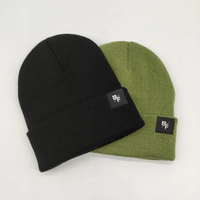 Gorro de invierno al por mayor para hombre y mujer, gorro tejido con etiqueta de parche tejido.