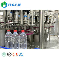 Ligne de production complète et personnalisée pour le remplissage de jus de fruits et d'eau aromatisée en bouteilles PET de 500 ml et 1 litre