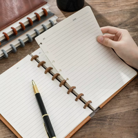 Carnet de notes A5 personnalisable éco-responsable à spirale, couverture rigide en cuir noir avec boucle métallique – Meilleures ventes