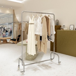 Expositor de ropa para tienda, de acero inoxidable, con <span class=keywords><strong>ruedas</strong></span>, para estudio de estilismo, con perchas, estante tipo isla para ropa de mujer - Product Image 1