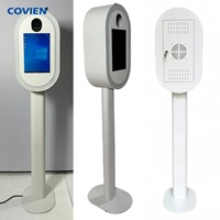 Équipement de photomaton, machine avec iPad, appareil photo reflex numérique, design ovale pour location d'événements de mariage