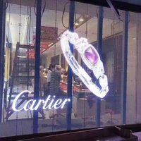 Pantalla LED Transparente Adhesiva, Película de Alta Transparencia con Clasificación IP65 y Función SDK para Pantallas Publicitarias en Exteriores