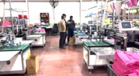 Ligne de production de couture entièrement automatique pour tissus en microfibre/argent