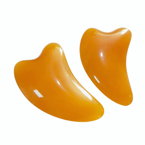 Outils de soin de la peau en résine en forme de cœur pour le lifting du visage par gua sha - Product Image 1