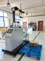 Ligne de conditionnement de caisses en carton entièrement automatique Machine automatique d'insertion et de scellage de sacs pour boîtes en carton