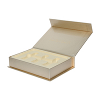 Boîte cadeau haut de gamme en forme de livre avec pelliculage mat, carton rigide, fermeture magnétique, insert en pâte à papier, boîte magnétique pour cosmétiques