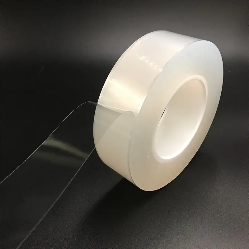 Rollo de película Opp autoadhesivo de celofán transparente recubierto de silicona de goma no residual de 50mm para impresión Digital