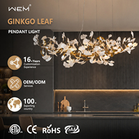 Lustre linéaire LED moderne de luxe en acier inoxydable avec feuilles de Ginkgo, dimmable, grande suspension décorative artistique pour la maison, la salle à manger, l'hôtel