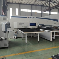 Mesin Punching Turret CNC Unit Servo Listrik Penuh untuk Kebutuhan Produksi Massal Cangkang Logam Kabinet Proteksi Kebakaran
