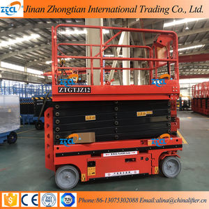 Mendorong sendiri gunting Lift Platform kerja 6-14m platform listrik penuh listrik mendorong sendiri gunting peralatan angkat - Product Image 3