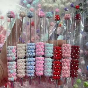 Nouveau stylo à bille rotatif en forme <span class=keywords><strong>de</strong></span> cœur pour la Saint-Valentin, best-seller transfrontalier, stylo à perles DIY, stylo à perles mignon - Product Image 1