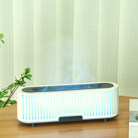 Diffuseur d'arômes ultrasonique 200 ml à effet bois lamellé avec lumière de flamme