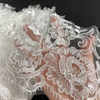 Belle garniture de dentelle de bordure de broderie de fleur ivoire pour la robe de mariée LT2487B