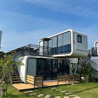Maison de conteneur en acier de luxe à deux étages, villa capsule mobile au design moderne pour une utilisation en extérieur dans les parcs, les centres commerciaux et les appartements