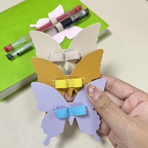 Vente chaude Papillon En Forme De <span class=keywords><strong>Bande</strong></span> Élastique Stylo Clip Autocollant Auto-adhésif En <span class=keywords><strong>Cuir</strong></span> Stylo Boucle Titulaire pour Livre Tablette et Ordinateur Portable - Product Image 3