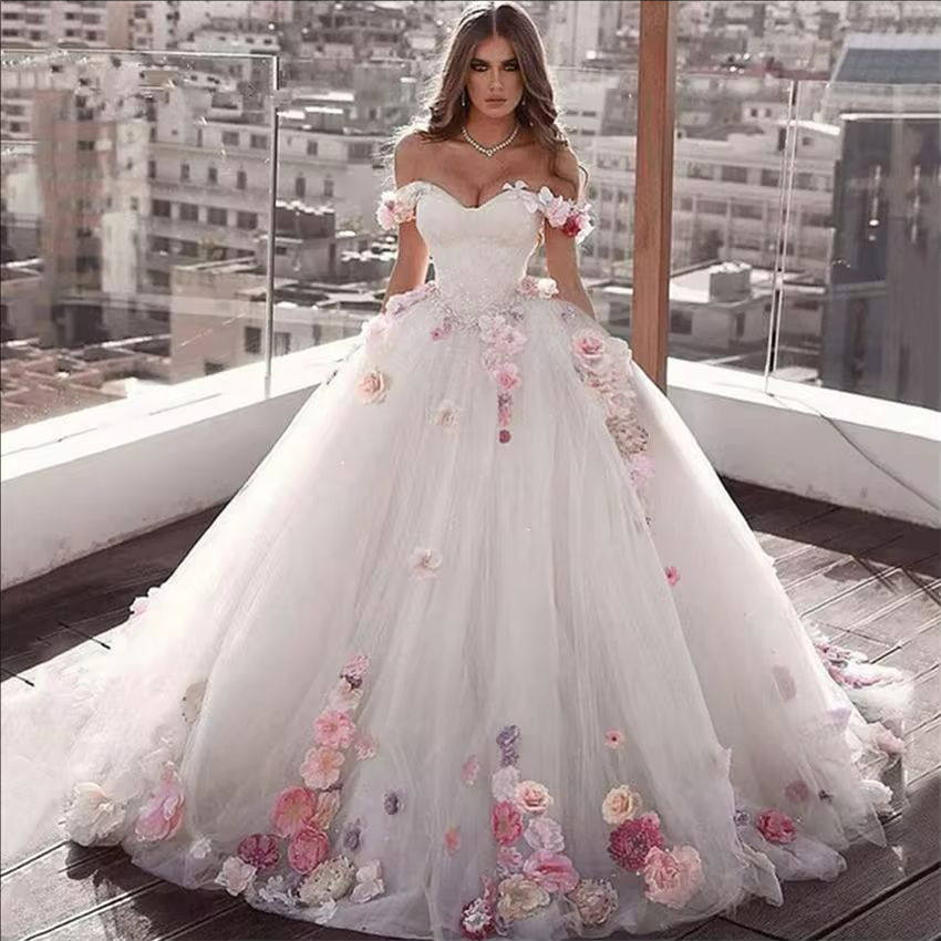 sweet sixteen dresses white Royal Queen RQ8142 V Neck Embellished Slit Wedding Gown This dress has a illusion neckline with a cutout back Sweet 16 Dresses BlingDress