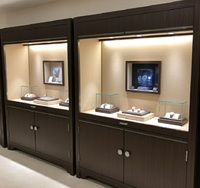 Vitrine murale de luxe GZowin en bois foncé pour montres, avec éclairage LED, dimensions personnalisables pour les magasins de détail haut de gamme