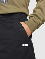 Design personnalisé Short d'été léger avec poche zippée Short noir uni pour hommes