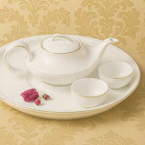 Juego de té de porcelana con adornos dorados de lujo-Tetera de cerámica elegante de 1000ml con tazas a juego para un hogar sofisticado - Product Image 1
