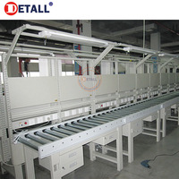 Ligne de production de convoyeurs à rouleaux pour l'assemblage de voitures et la manutention de différents types de marchandises