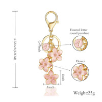 QICHONG Style coréen AliExpress Commerce extérieur Nouveau porte-clés en métal avec pendentif fleur rose 26 lettres pour sac et clé de voiture