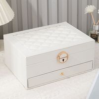 Boîte de rangement pour bijoux en cuir haut de gamme, doublure en daim, forme carrée, design personnalisable, service OEM, vente en gros, rangement portable