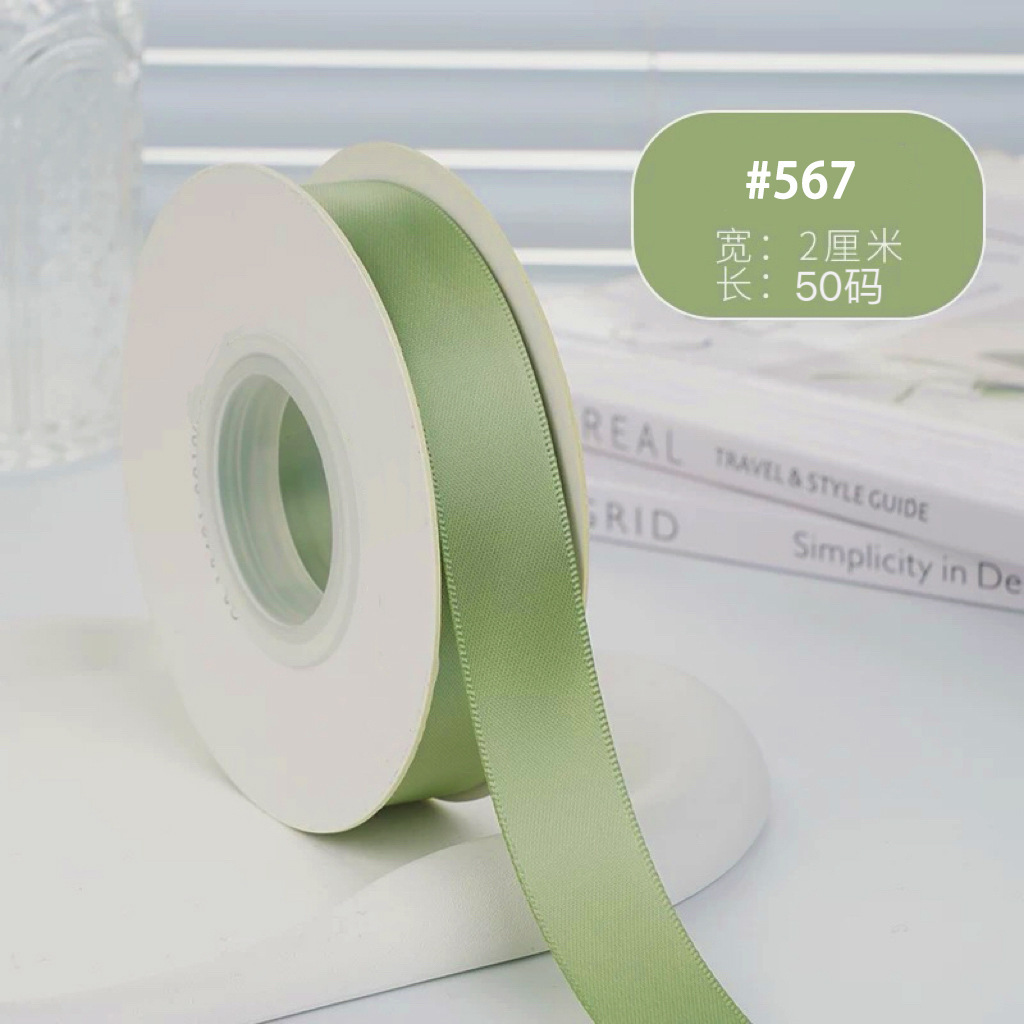 #ริบบิ้นโพลีเอสเตอร์ สีเขียวถั่ว ขนาด 2 ซม. ยาว 50 หลา จำนวน 567 ม้วน - - -
