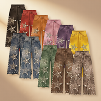 Jeans de poids moyen avec décorations étoiles en strass, design à œillets métalliques, style streetwear individuel et élégant pour femmes