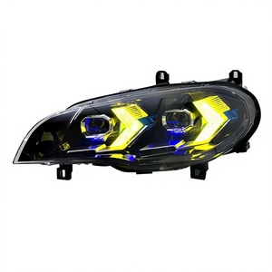 Gruppo Fari Anteriori per BMW X5 E70 07-13 con Luci Diurne a Doppia Modalità 12V - Product Image 1