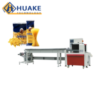Machine d'emballage horizontale pour biscuits, pain, gâteaux, barres de céréales et autres aliments