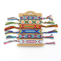 Bracelet tissé avec ficelle brodée personnalisée Bracelets brodés plus tôt en lin Snoopy Boho Tassel Logo personnalisé Bracelets brodés