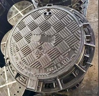 Couvercle de regard en fonte ductile GGG50 vs Grille de drainage des eaux pluviales en fonte gris traditionnelle, classe de charge lourde D400