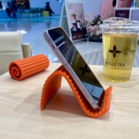 Support de téléphone et tablette pliable en silicone, antidérapant, pliable de manière créative pour tous les angles, accessoire de voyage pour bureau