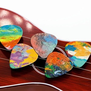 Juego de 10 Púas de Guitarra Coloridas, Plectros de Ukelele Pintados a Mano con Diseños Artísticos, Accesorios para Guitarra y Bajo - Product Image 4