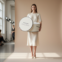 Boîte d'emballage de chapeau en carton ronde personnalisée avec poignée en corde, gaufrage, laminage mat et revêtement UV