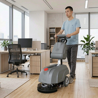 Nettoyeur de sols compact à main avec 1350 ㎡ Autolaveuse compacte à conducteur à bord pour hôtels, supermarchés et bureaux, offrant une efficacité de nettoyage optimale