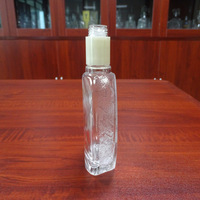 Vodka haut de gamme, bouteilles de verre à liqueur rondes et plates avec logo personnalisé, 150 ml