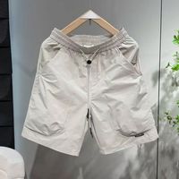 Nouveau short de sport polyvalent pour homme, style américain, avec poches 3D cousues, cordon de serrage, en polyester/rayonne, séchage rapide, respirant et rafraîchissant